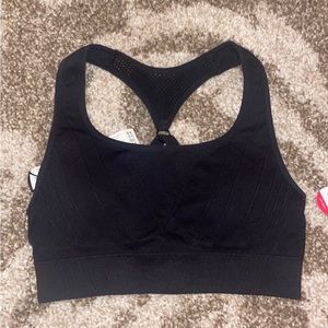 Flexible sports bra. Small. Never worn!